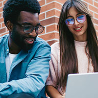 Business partners working together on a laptop